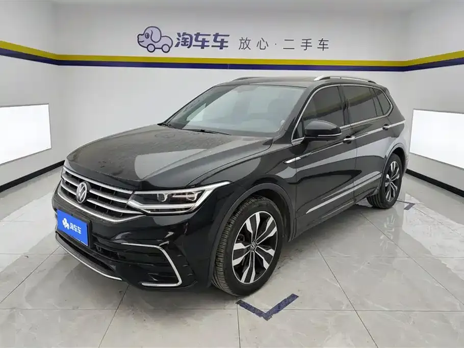 Volkswagen Tiguan L — фото 1