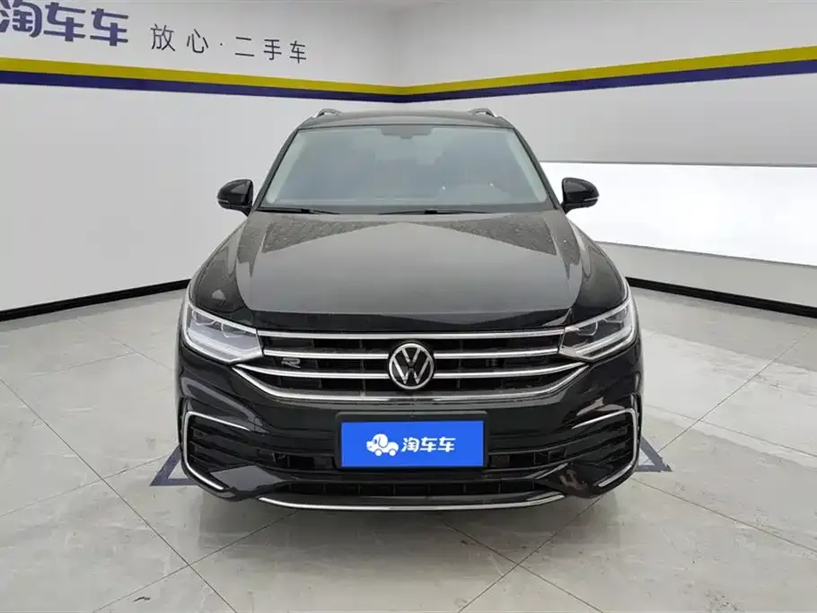 Volkswagen Tiguan L — фото 2