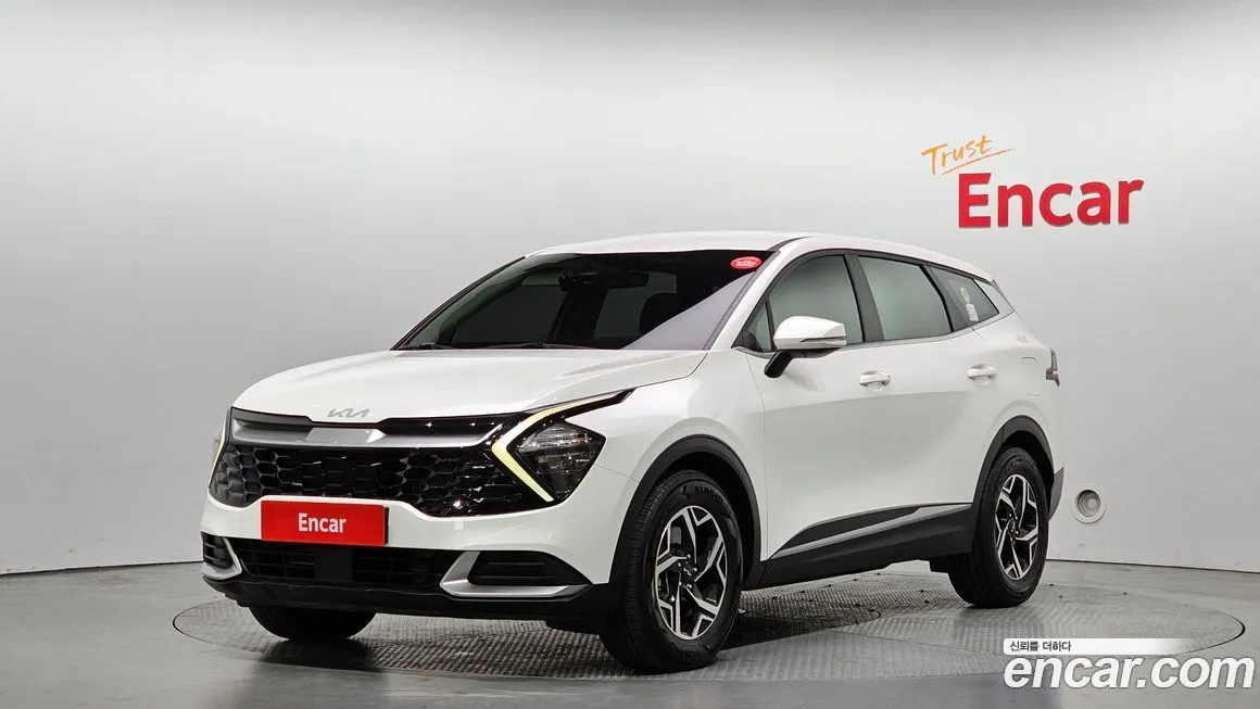 Kia Sportage — фото 1