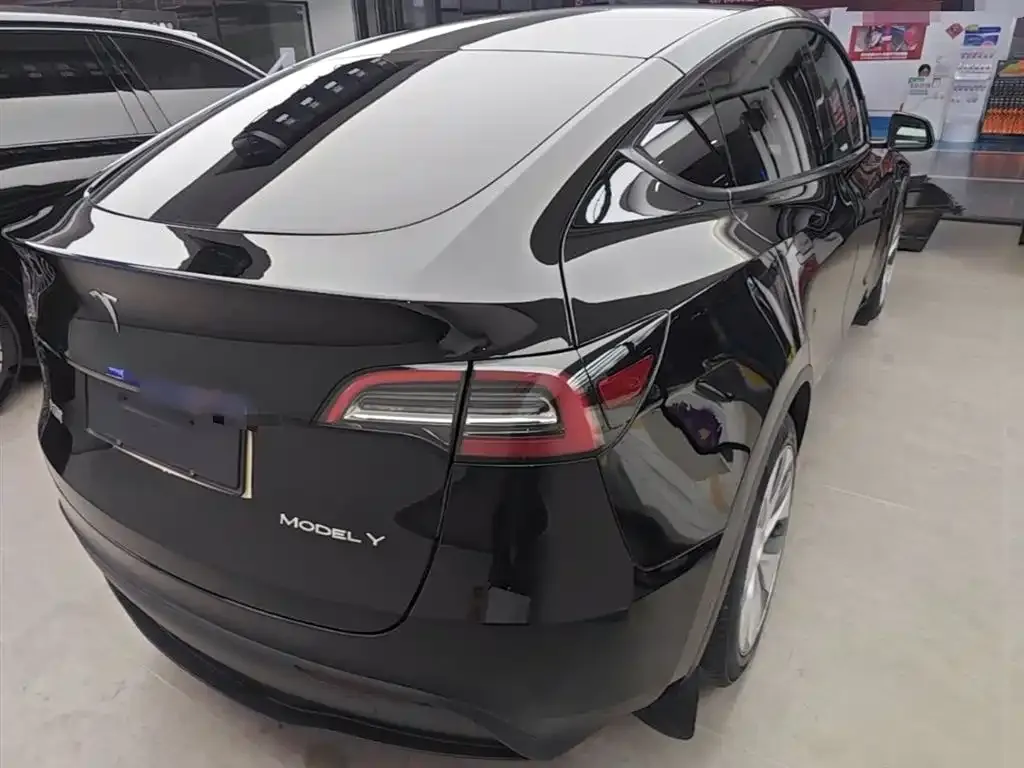 Tesla Model Y — фото 7