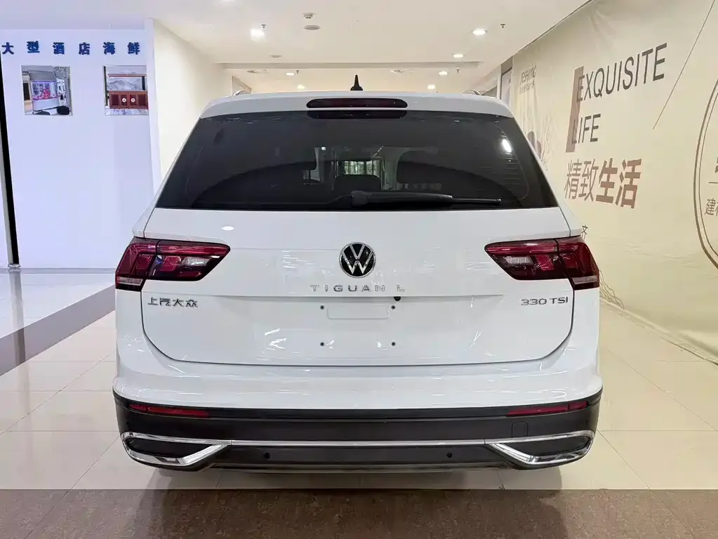 Volkswagen Tiguan L — фото 7