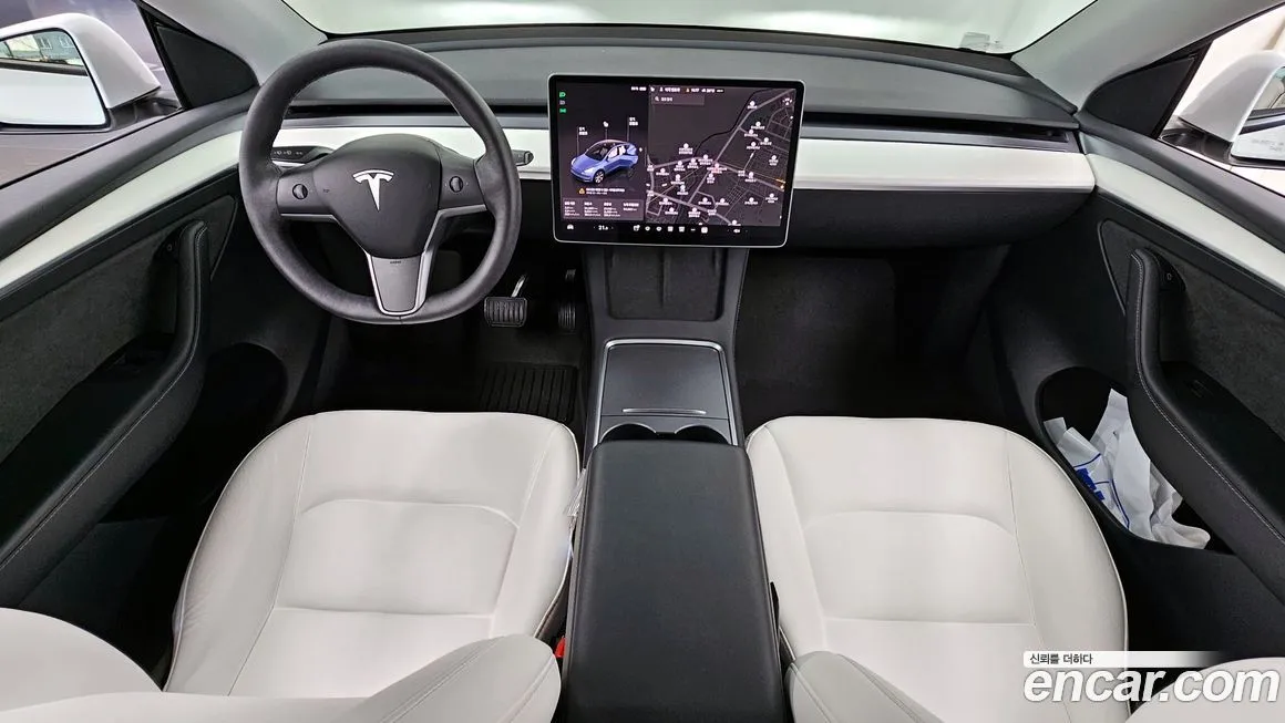 Tesla Model Y — фото 10
