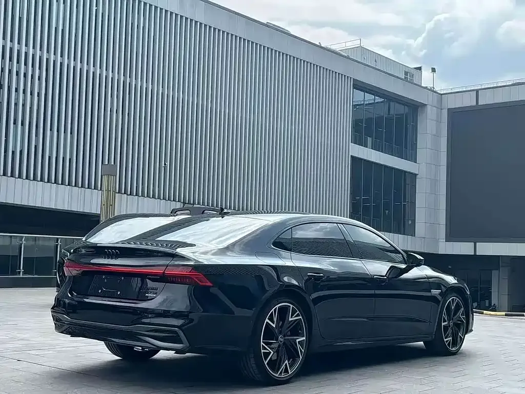 Audi A7L — фото 8