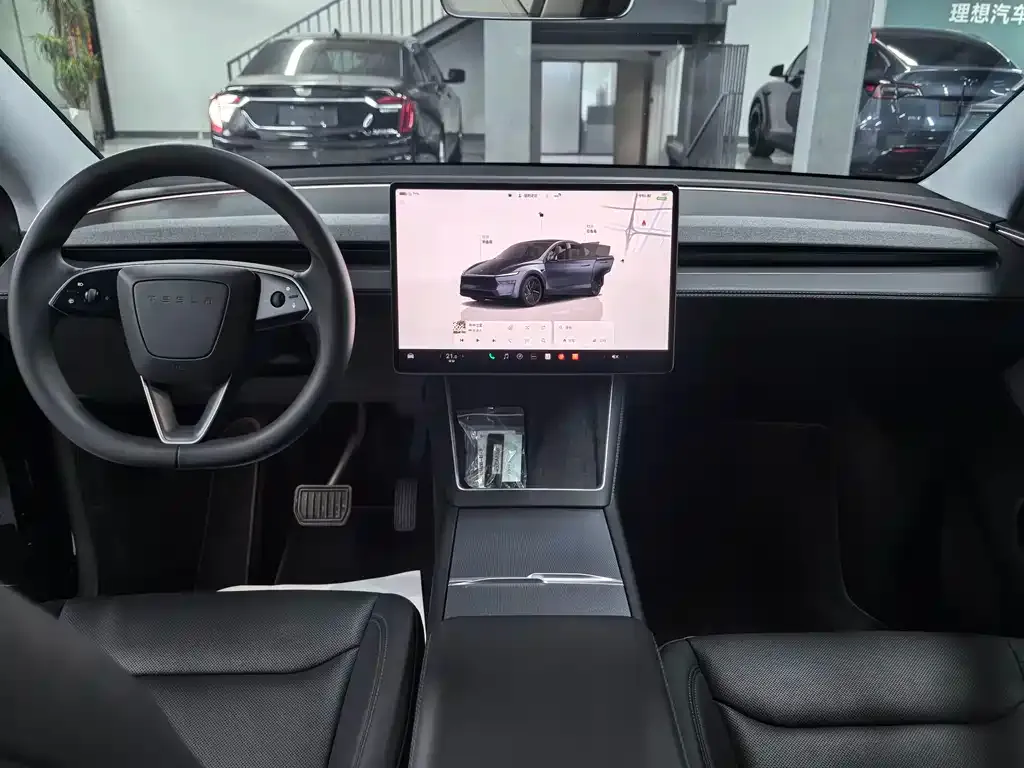 Tesla Model Y — фото 5