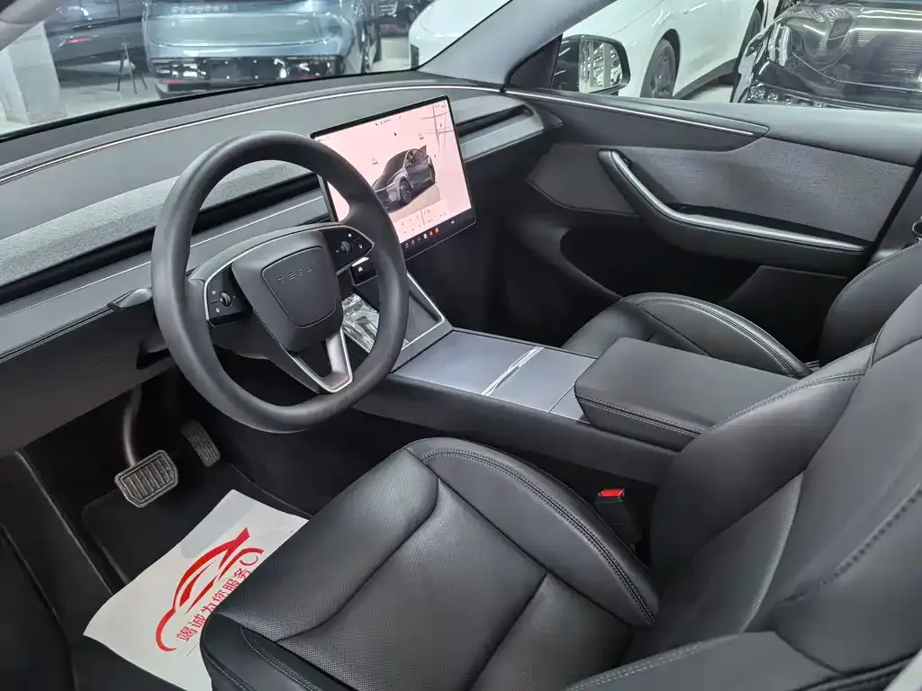 Tesla Model Y — фото 7