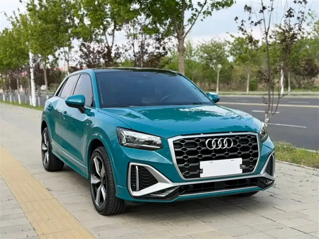 Audi Q2L — фото 5
