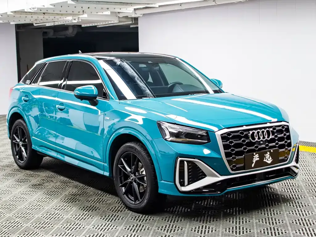 Audi Q2L — фото 10