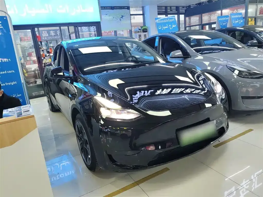 Tesla Model Y — фото 8