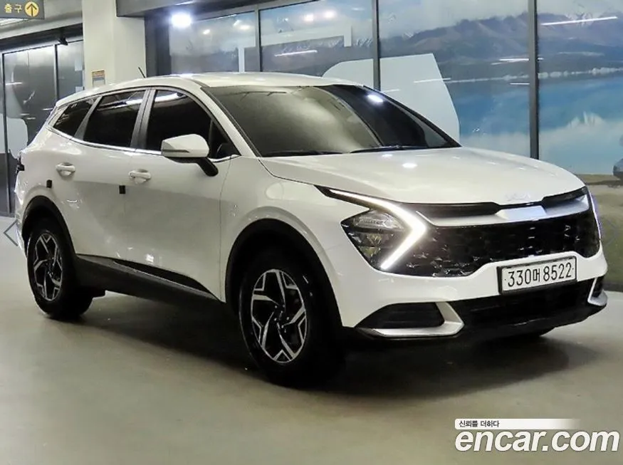 Kia Sportage — фото 1