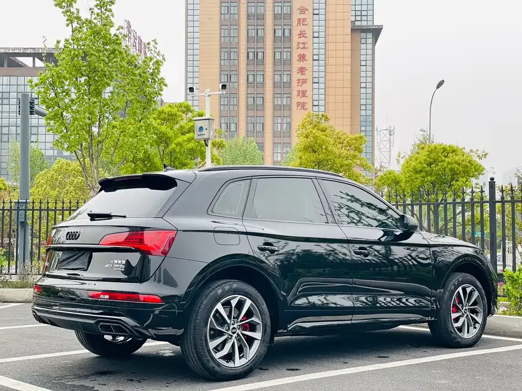 Audi Q5L — фото 7