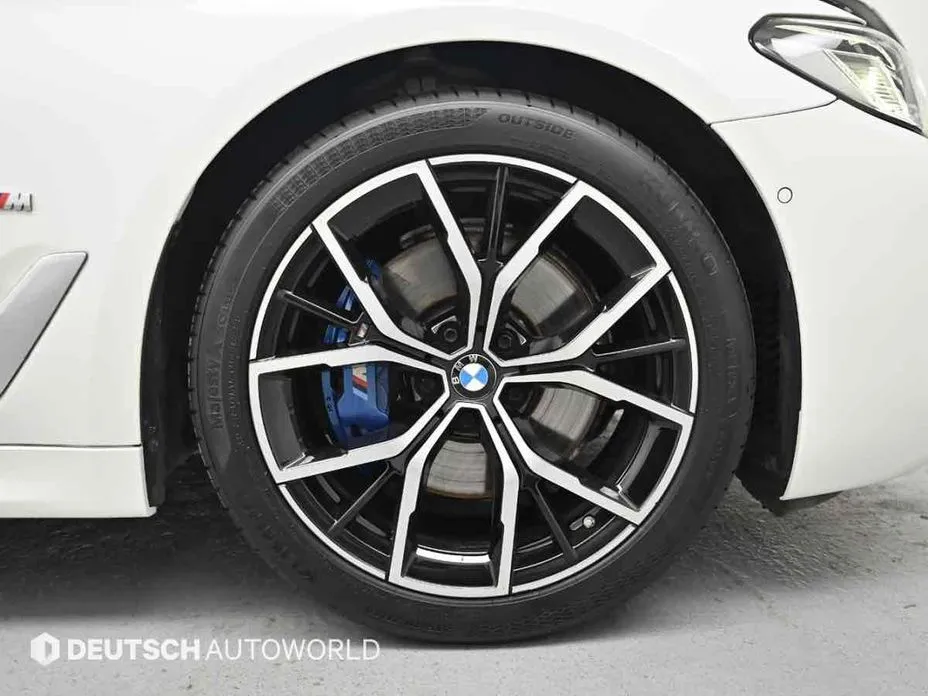 BMW 5-Series — фото 10
