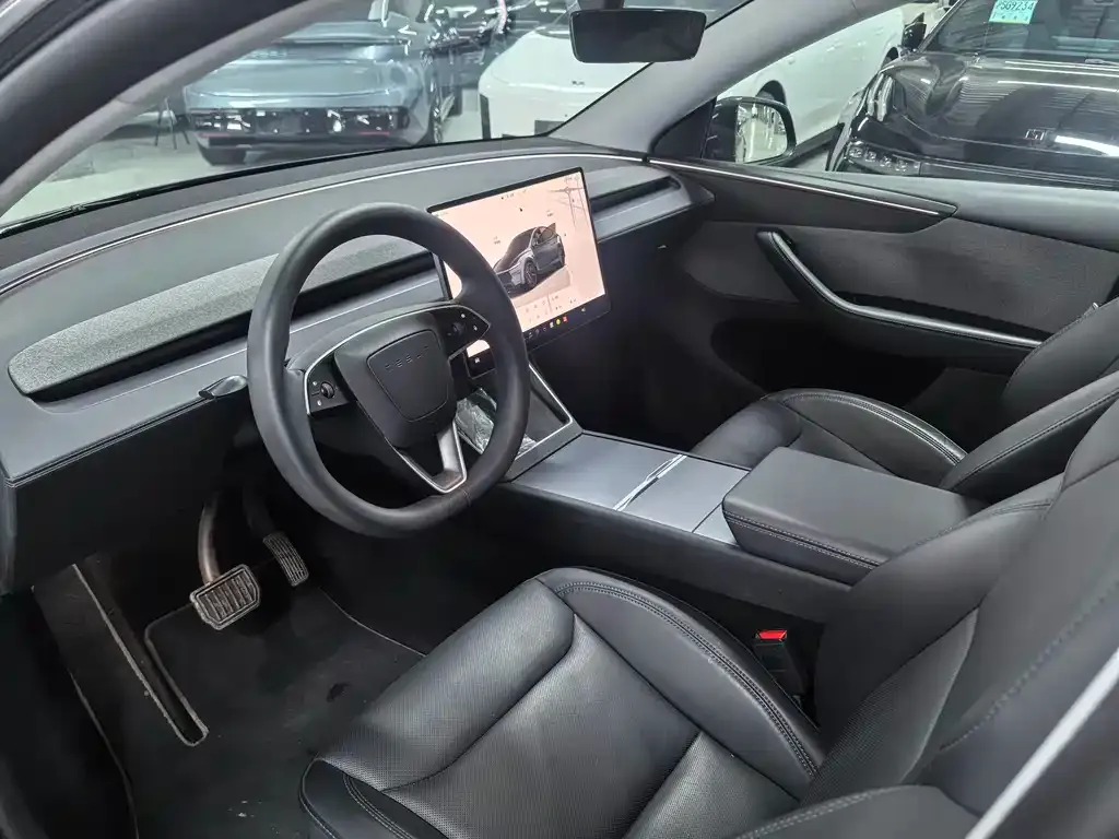 Tesla Model Y — фото 7