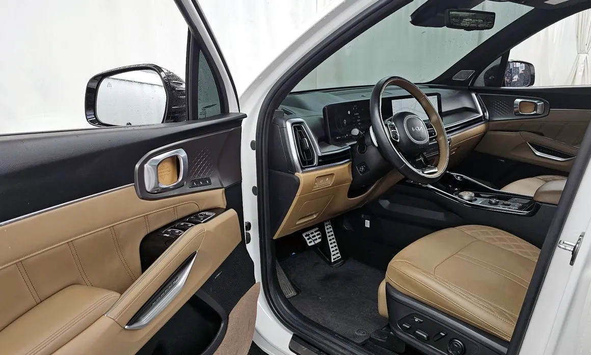 Kia Sorento — фото 10