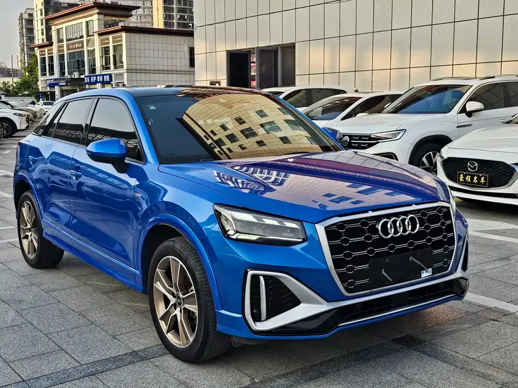 Audi Q2L — фото 7