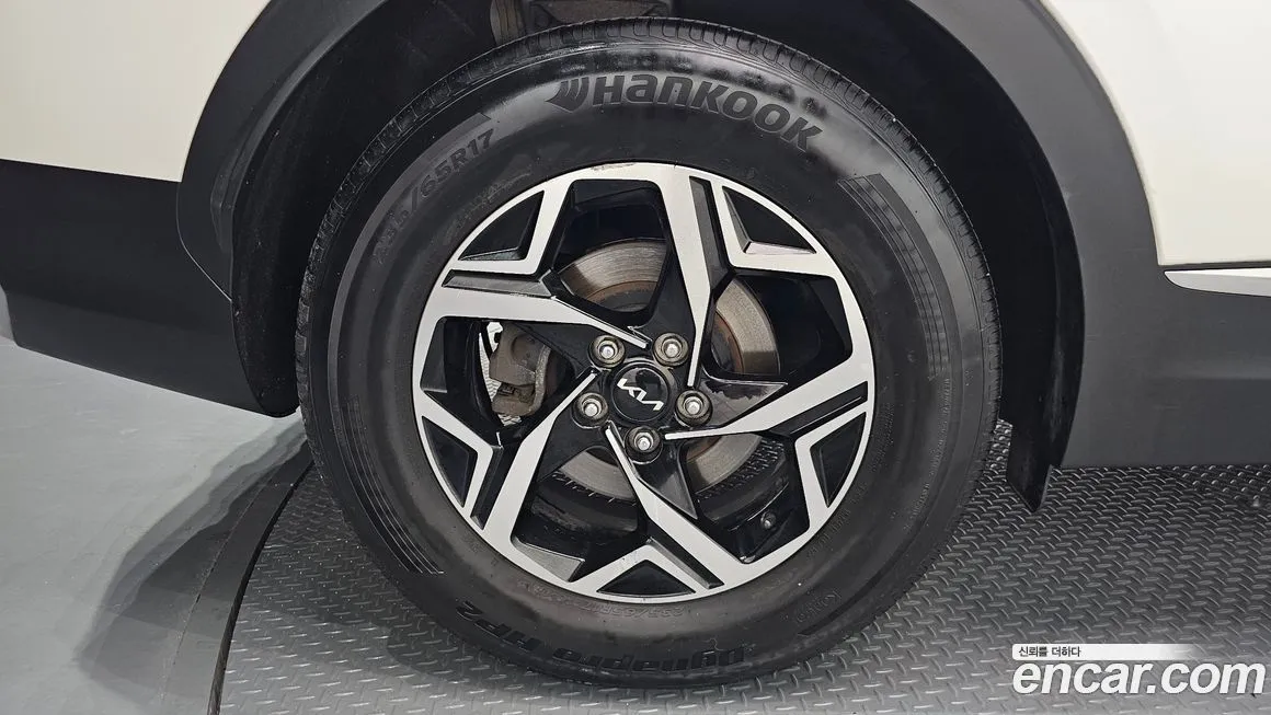 Kia Sportage — фото 10