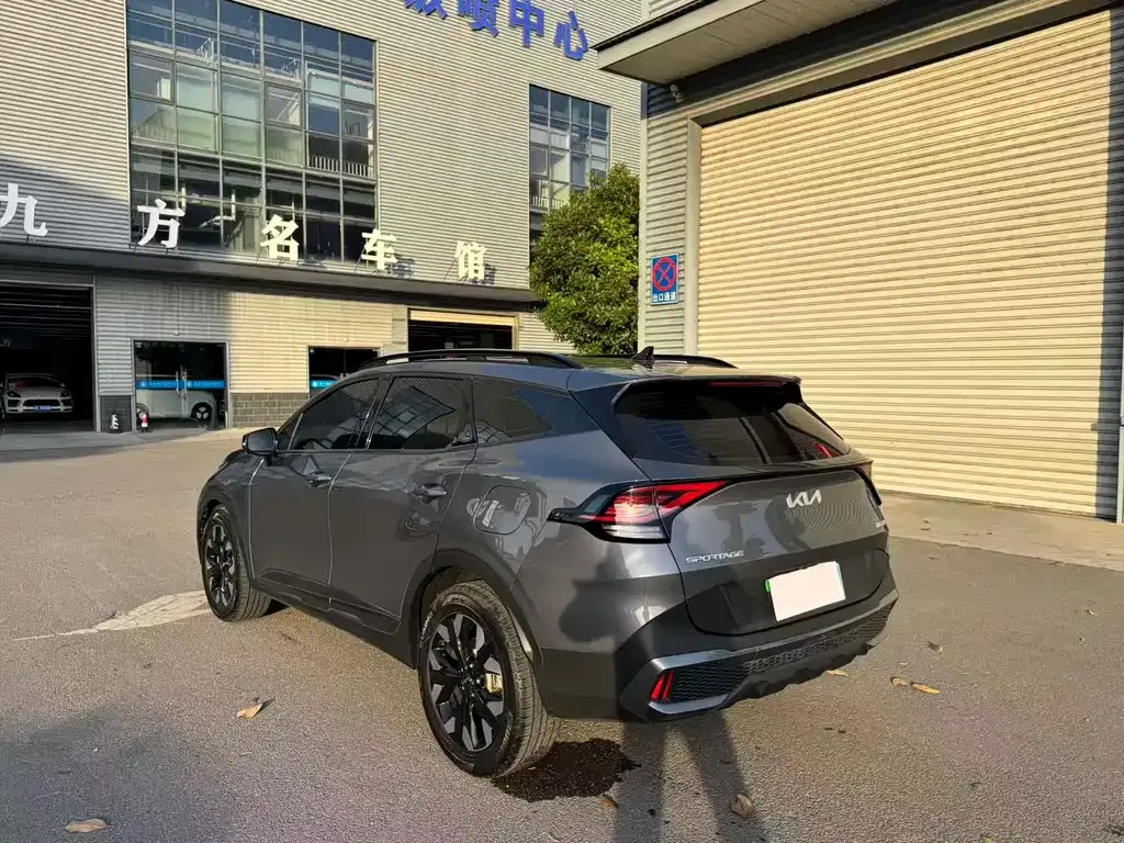 Kia Sportage — фото 10