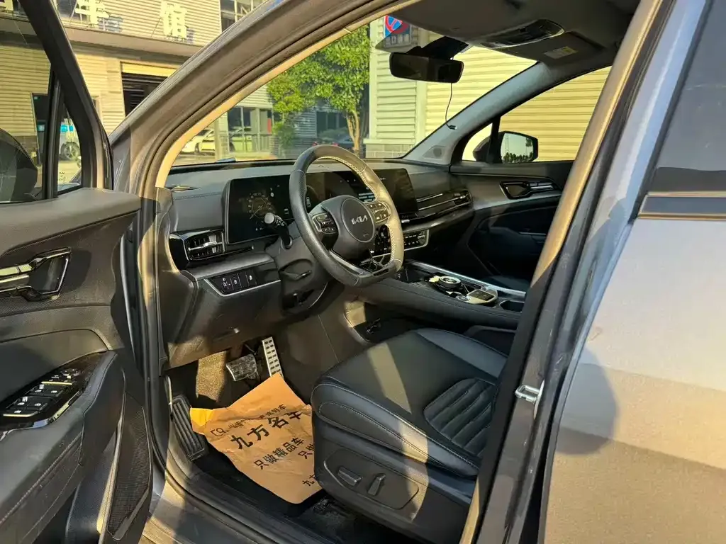 Kia Sportage — фото 7