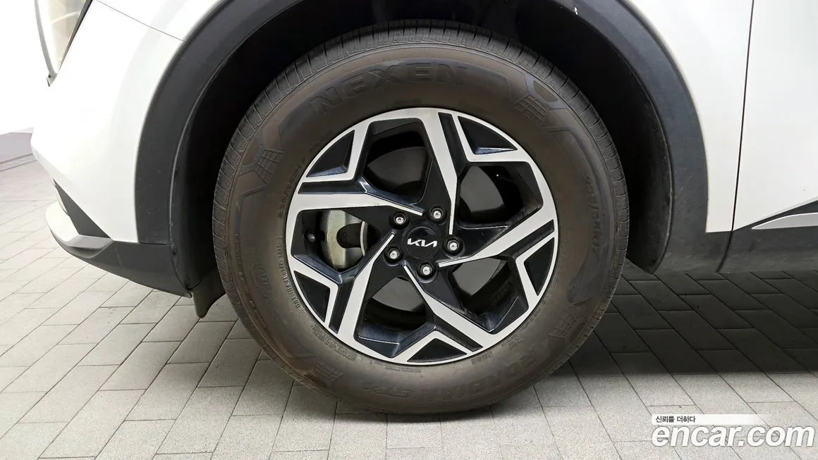 Kia Sportage — фото 10
