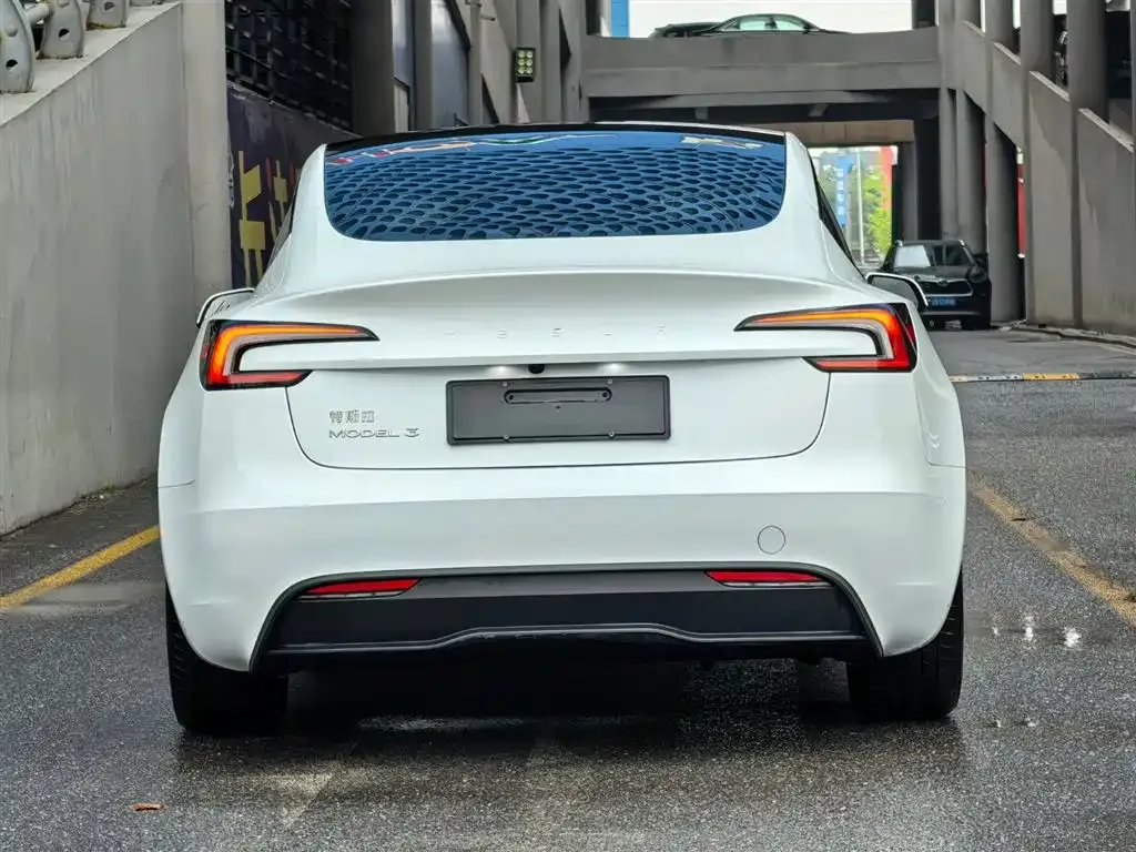 Tesla Model 3 — фото 9