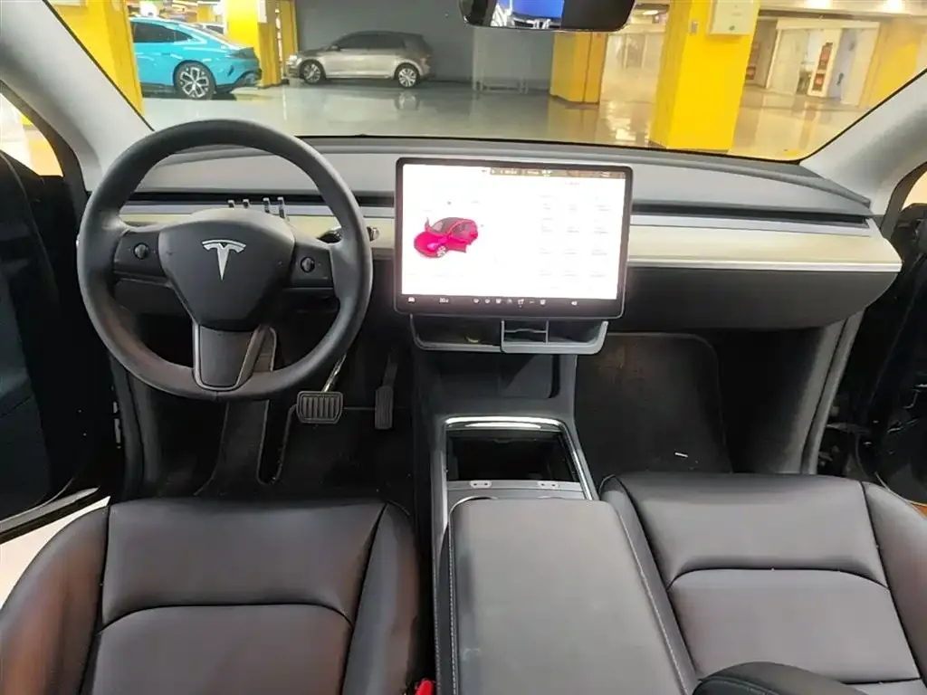 Tesla Model Y — фото 10