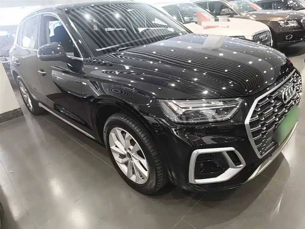 Audi Q5L — фото 6