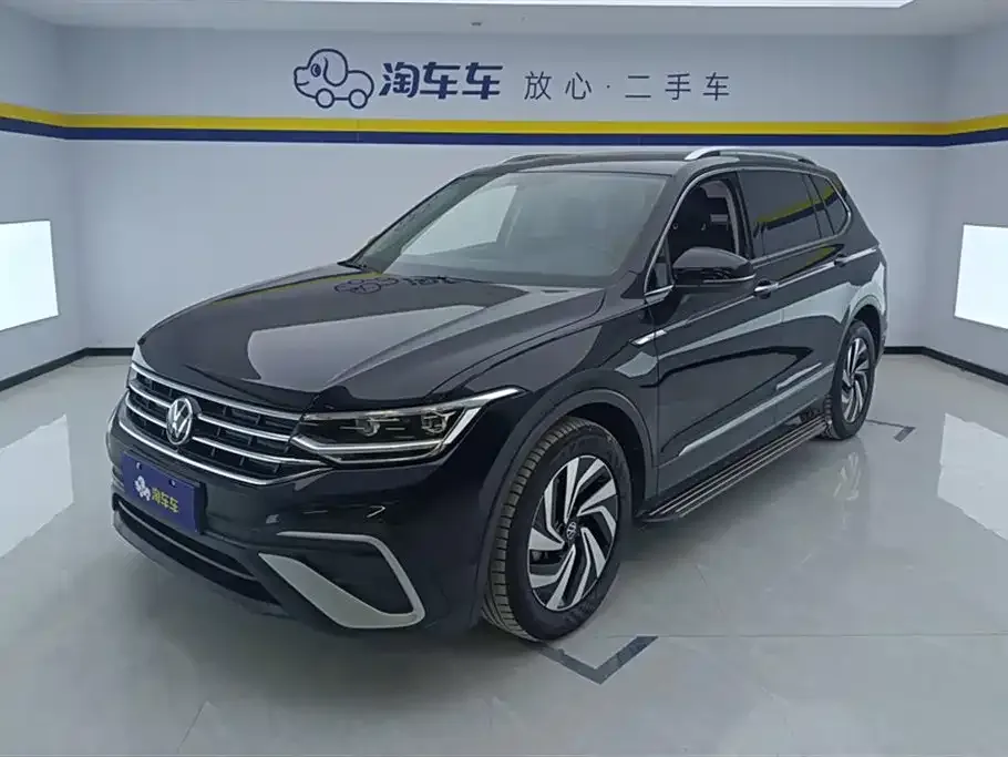 Volkswagen Tiguan L — фото 1