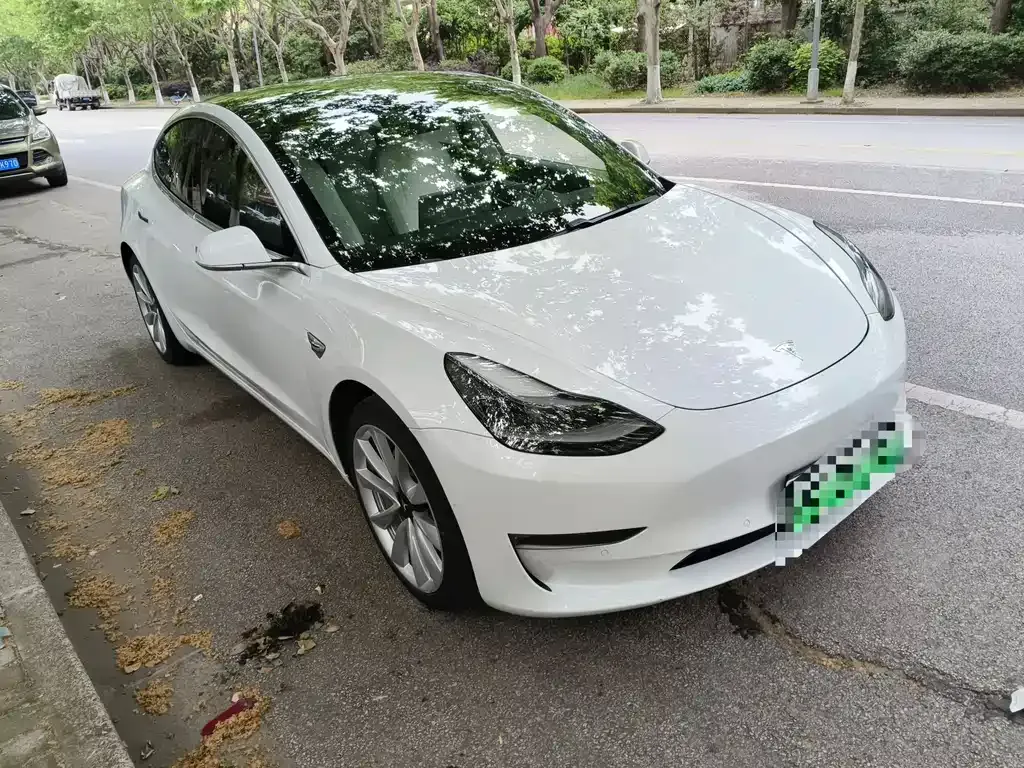 Tesla Model 3 — фото 7