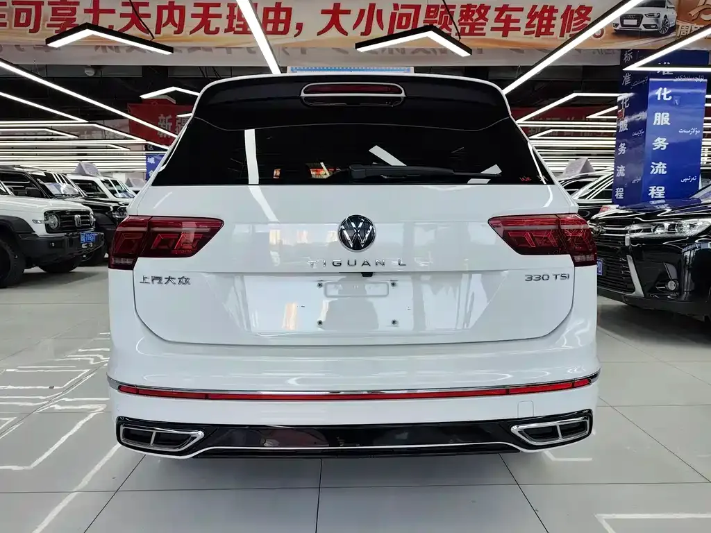 Volkswagen Tiguan L — фото 10