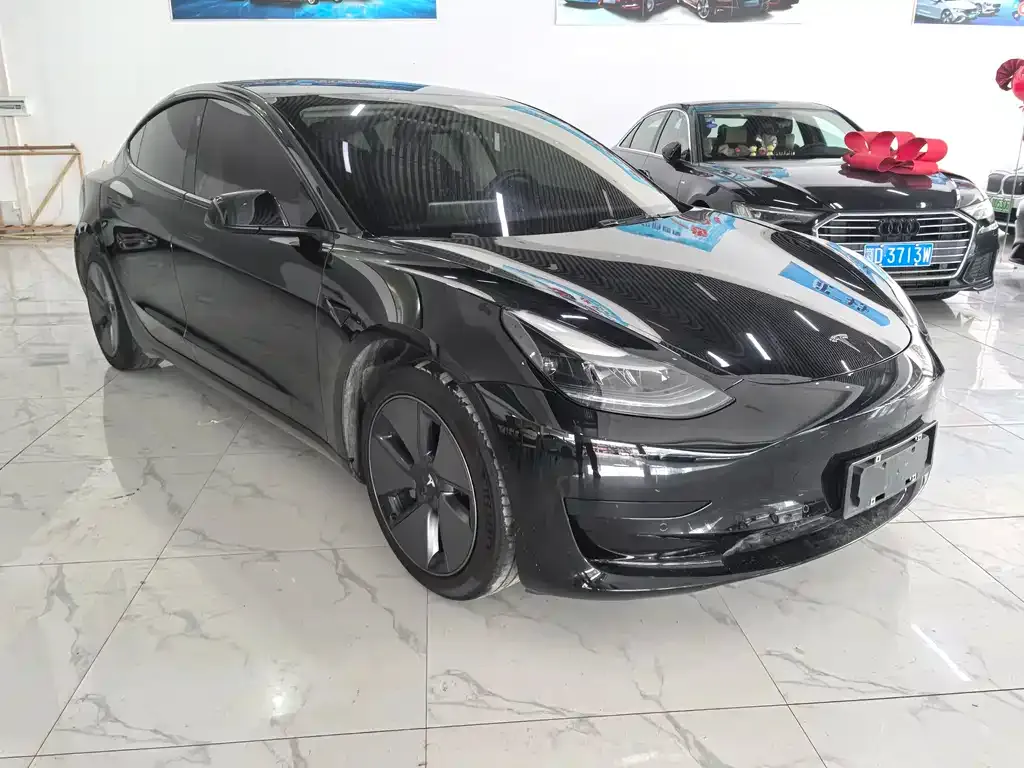 Tesla Model 3 — фото 9