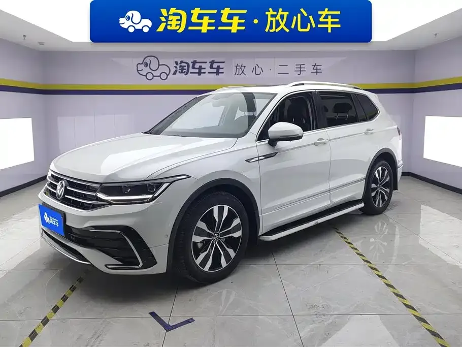 Volkswagen Tiguan L — фото 1