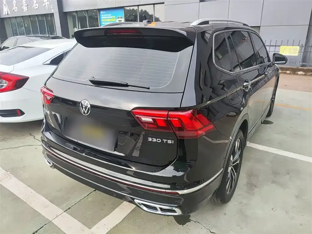 Volkswagen Tiguan L — фото 8