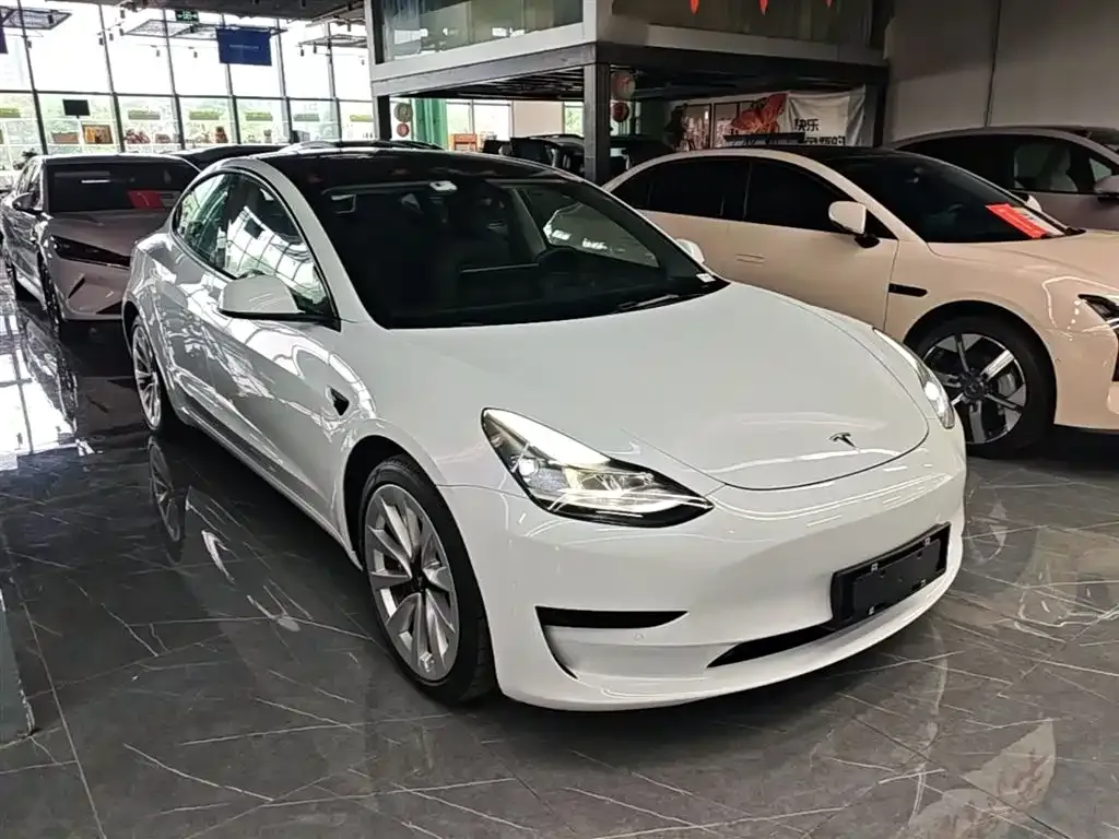 Tesla Model 3 — фото 7