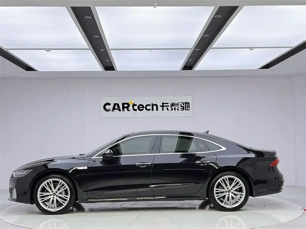 Audi A7L — фото 8