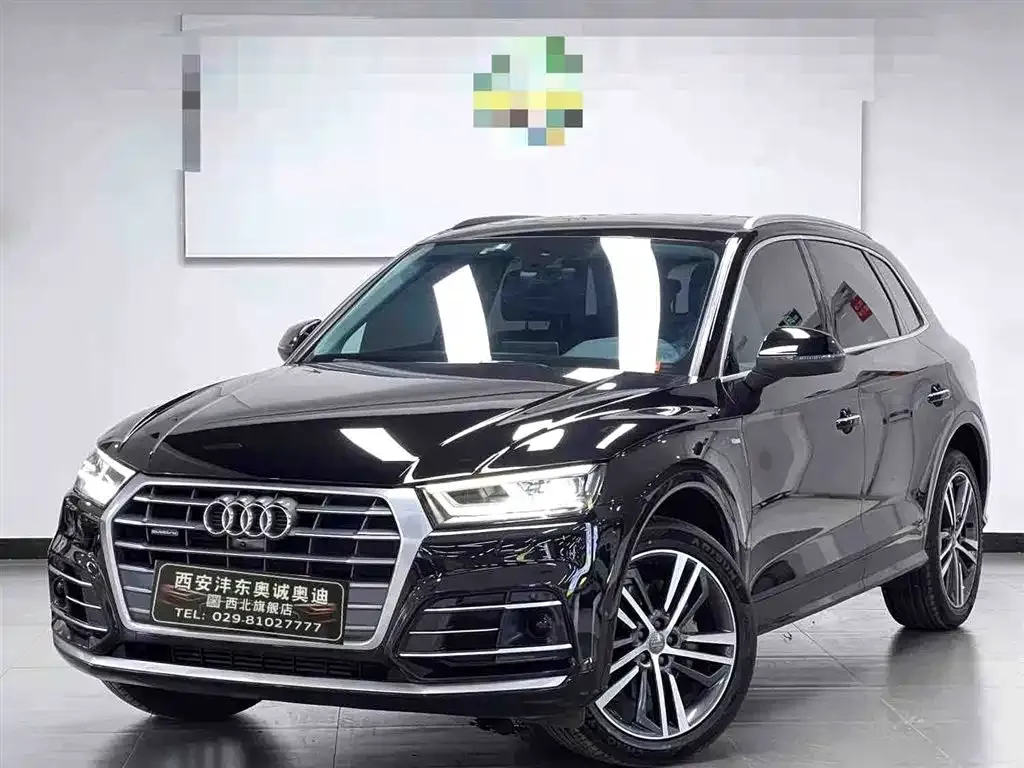 Audi Q5L — фото 5