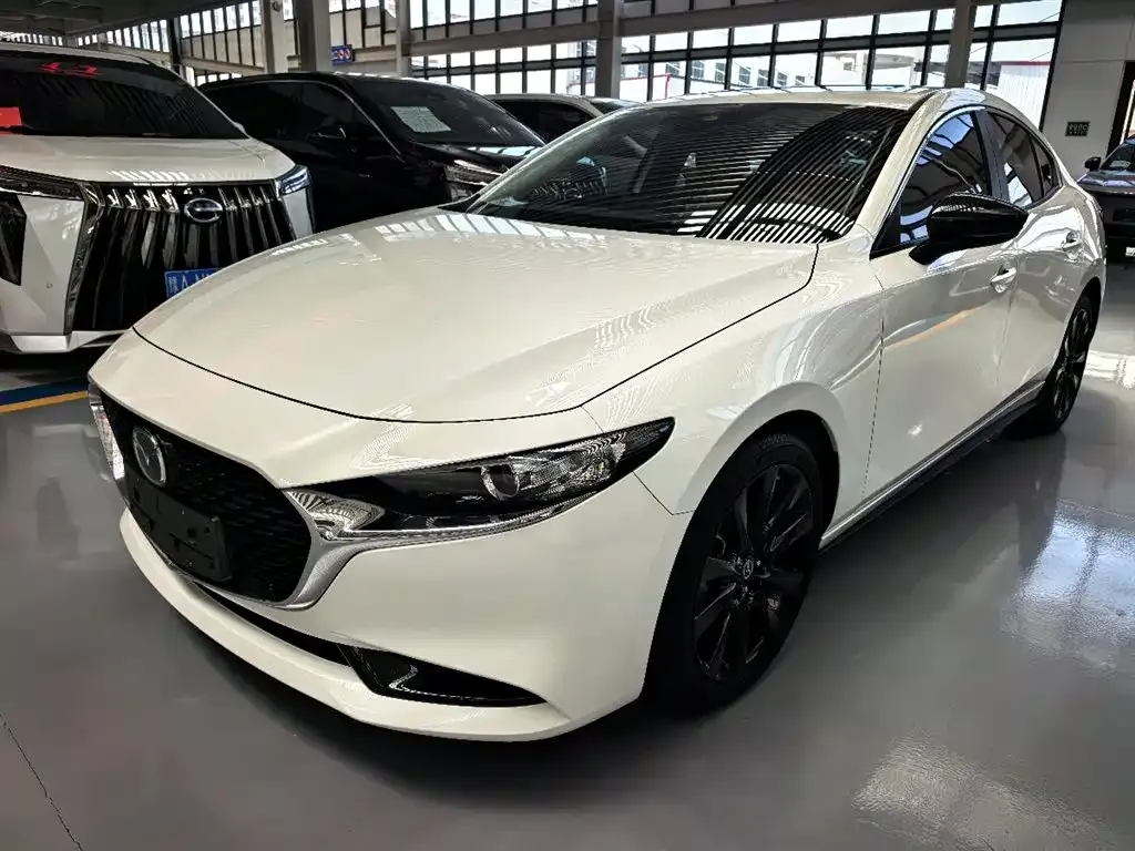 Mazda 3 Axela — фото 1