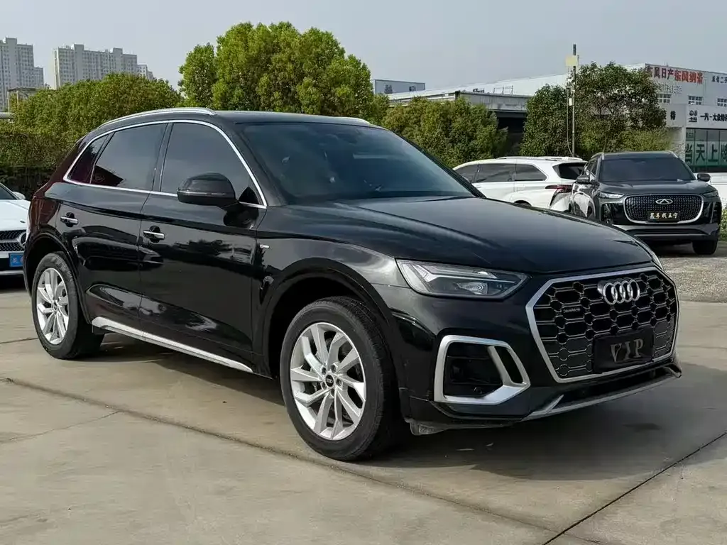 Audi Q5L — фото 9