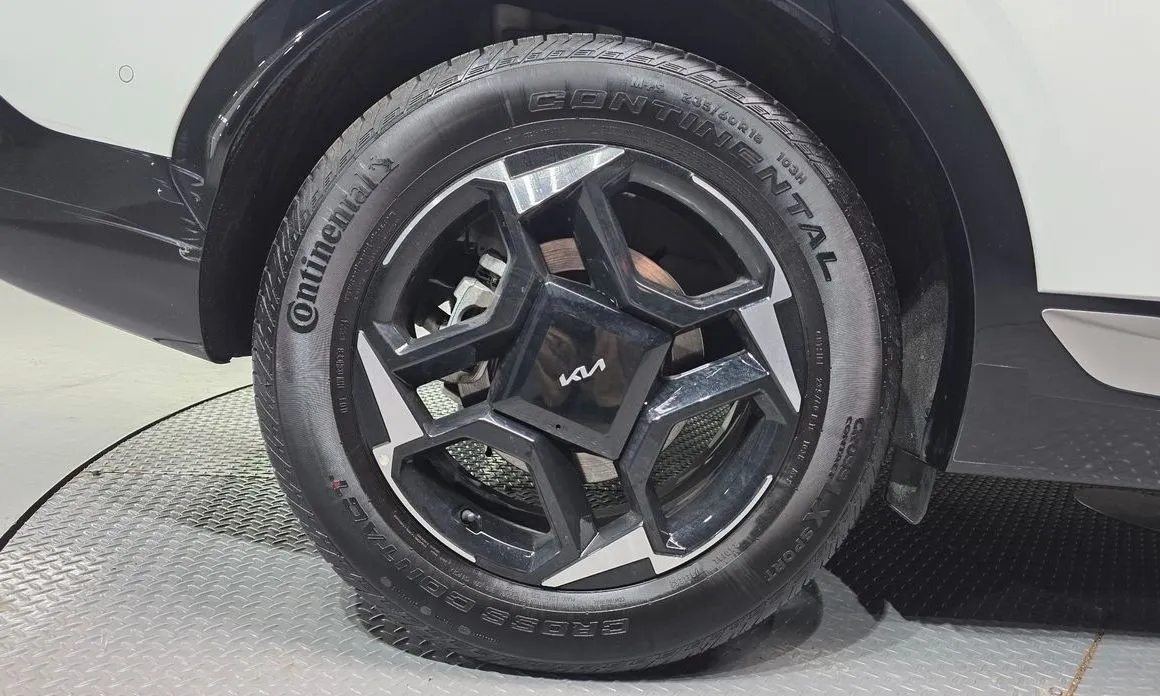 Kia Sportage — фото 10