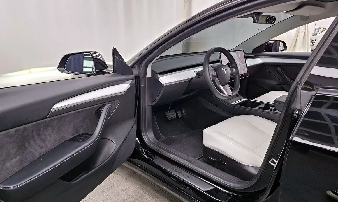 Tesla Model 3 — фото 9