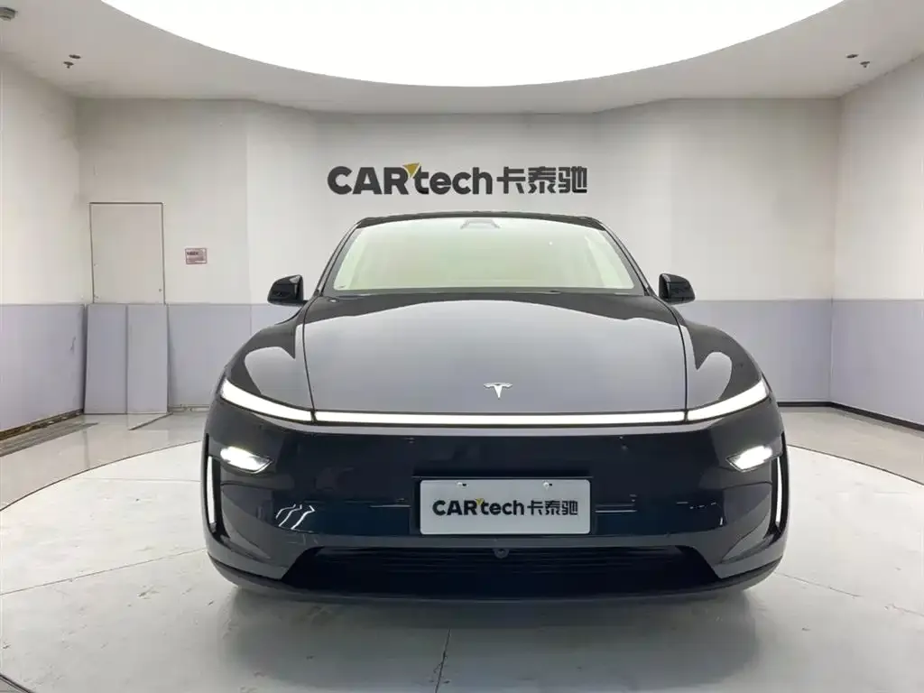 Tesla Model Y — фото 6