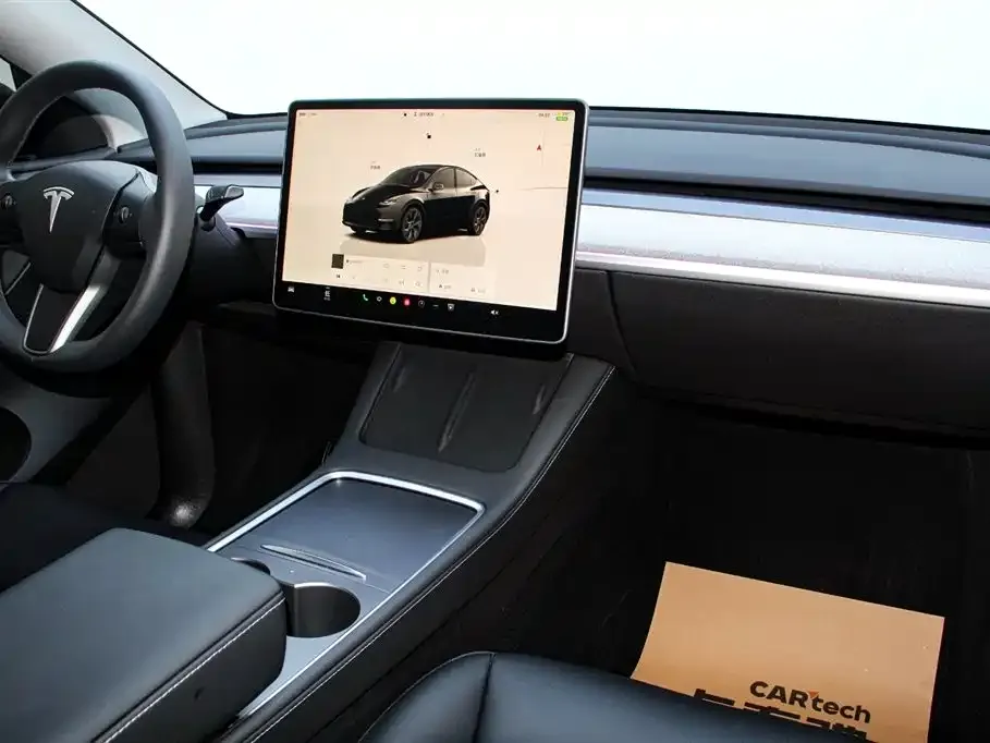 Tesla Model Y — фото 8