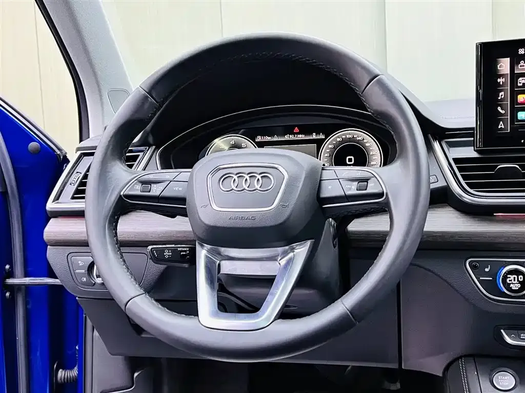 Audi Q5L — фото 10