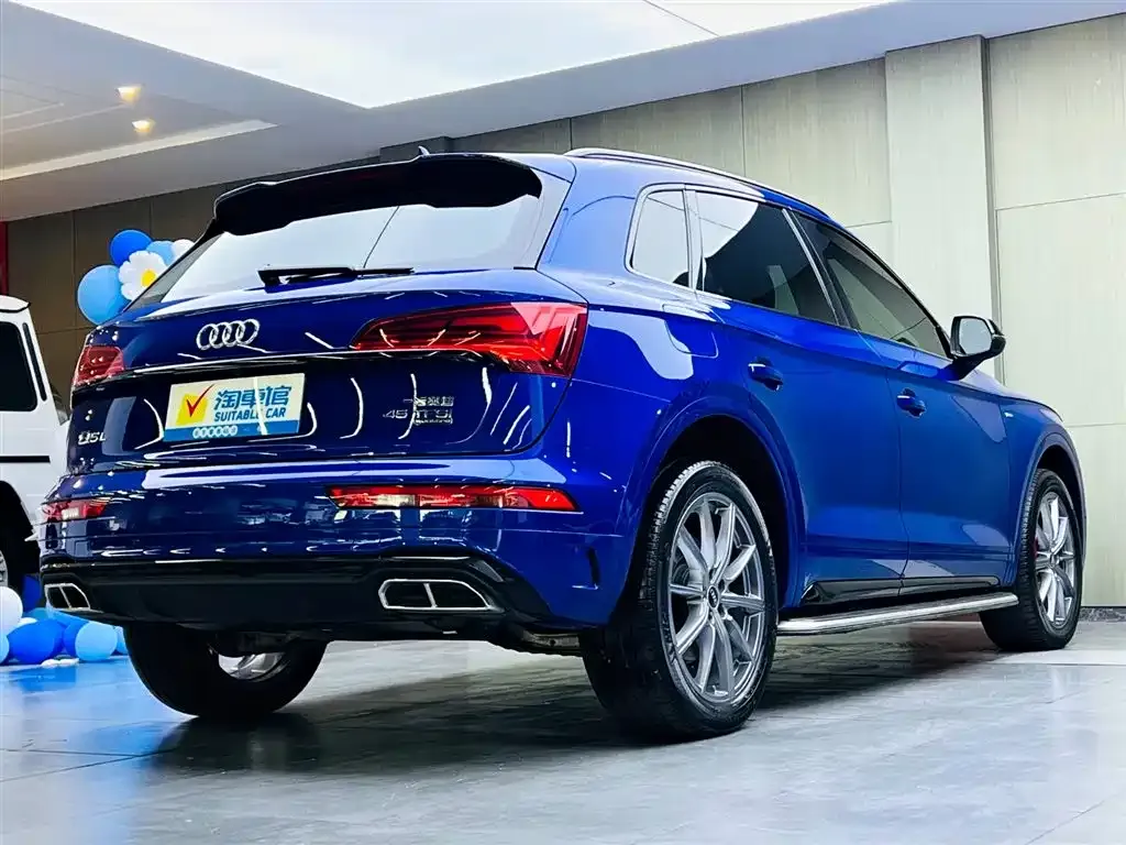 Audi Q5L — фото 9