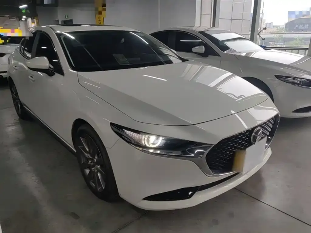 Mazda 3 Axela — фото 10
