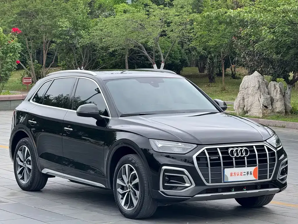 Audi Q5L — фото 10