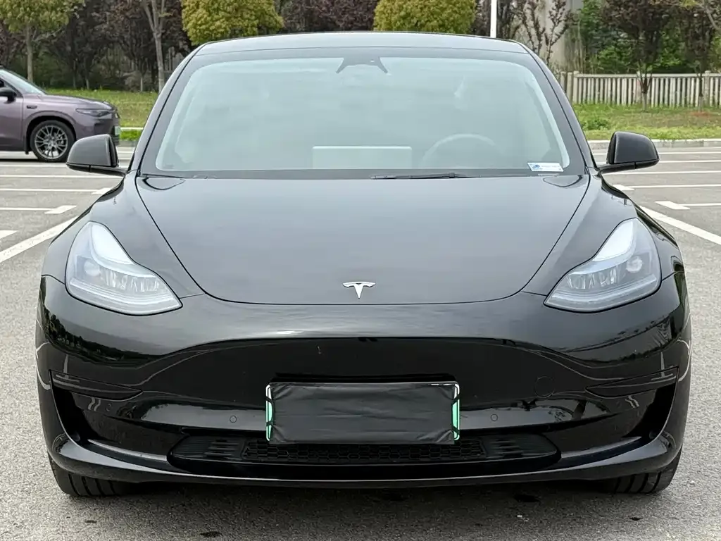 Tesla Model 3 — фото 7