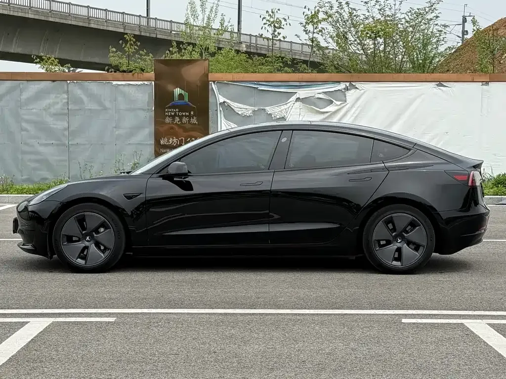 Tesla Model 3 — фото 5