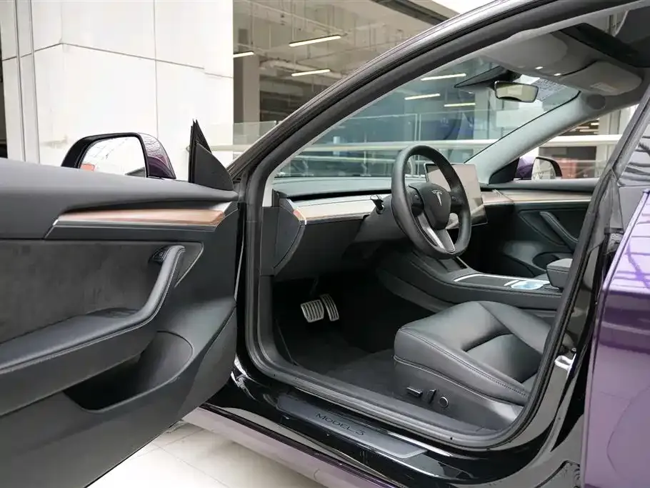 Tesla Model 3 — фото 9