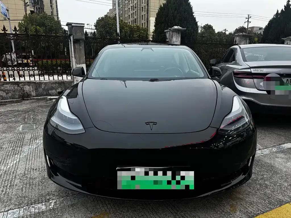 Tesla Model 3 — фото 10
