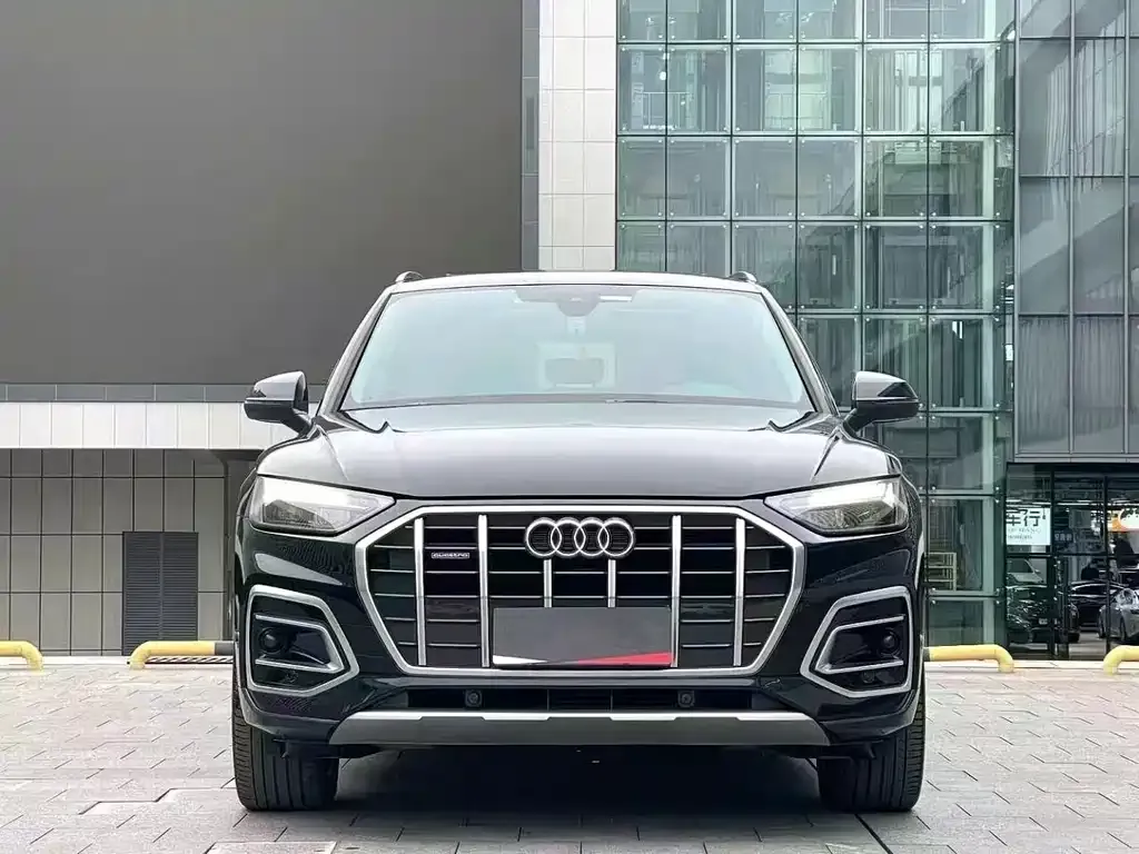 Audi Q5L — фото 5