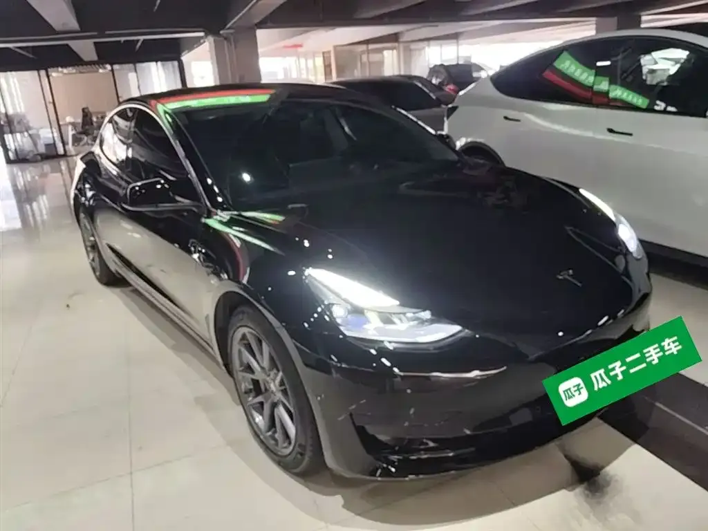 Tesla Model 3 — фото 9